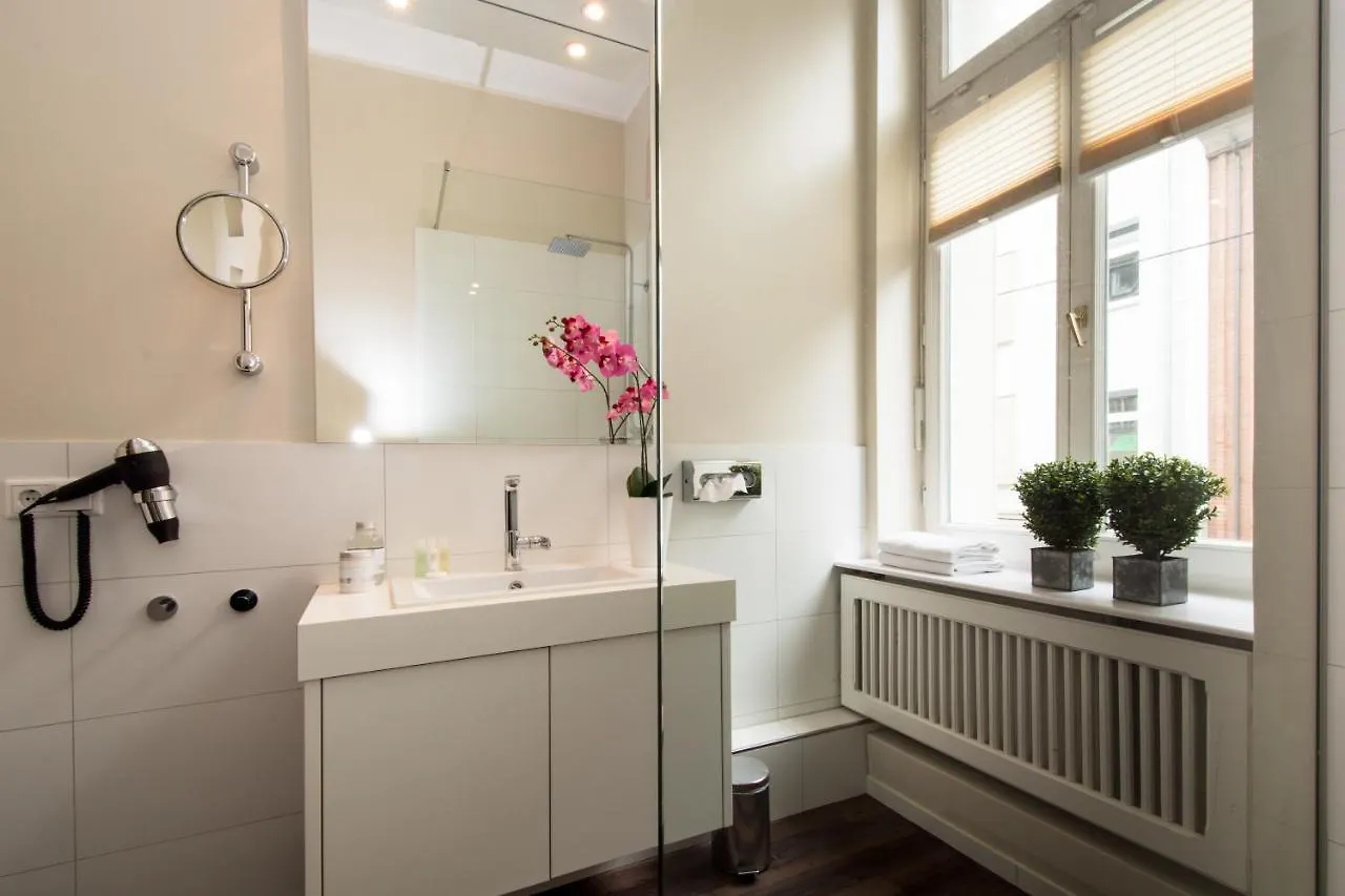 Апарт-отель Living Am Carlsplatz Apartment Дюссельдорф